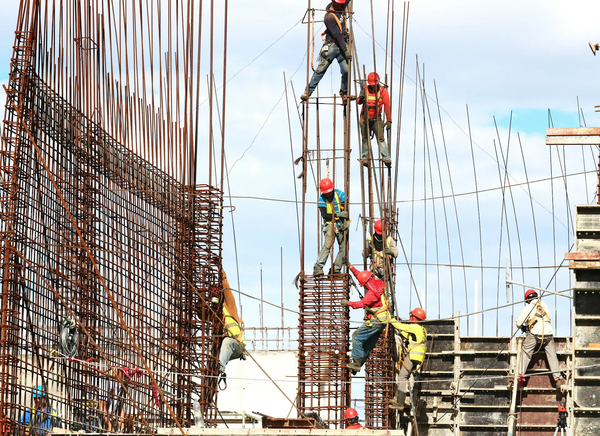 ASD SUNMOON Construction Company people working on building during daytime